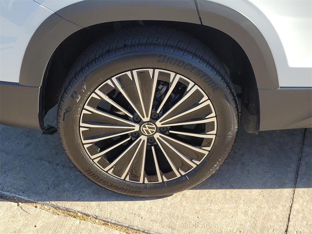 used 2025 Volkswagen Taos car, priced at $26,882