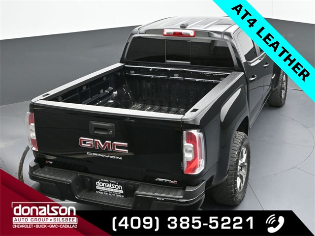 used 2021 GMC Canyon car, priced at $29,131