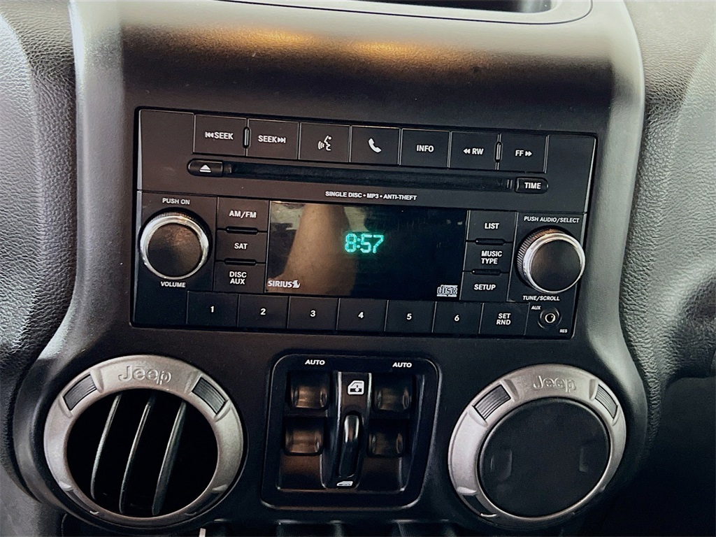 used 2015 Jeep Wrangler car, priced at $17,889