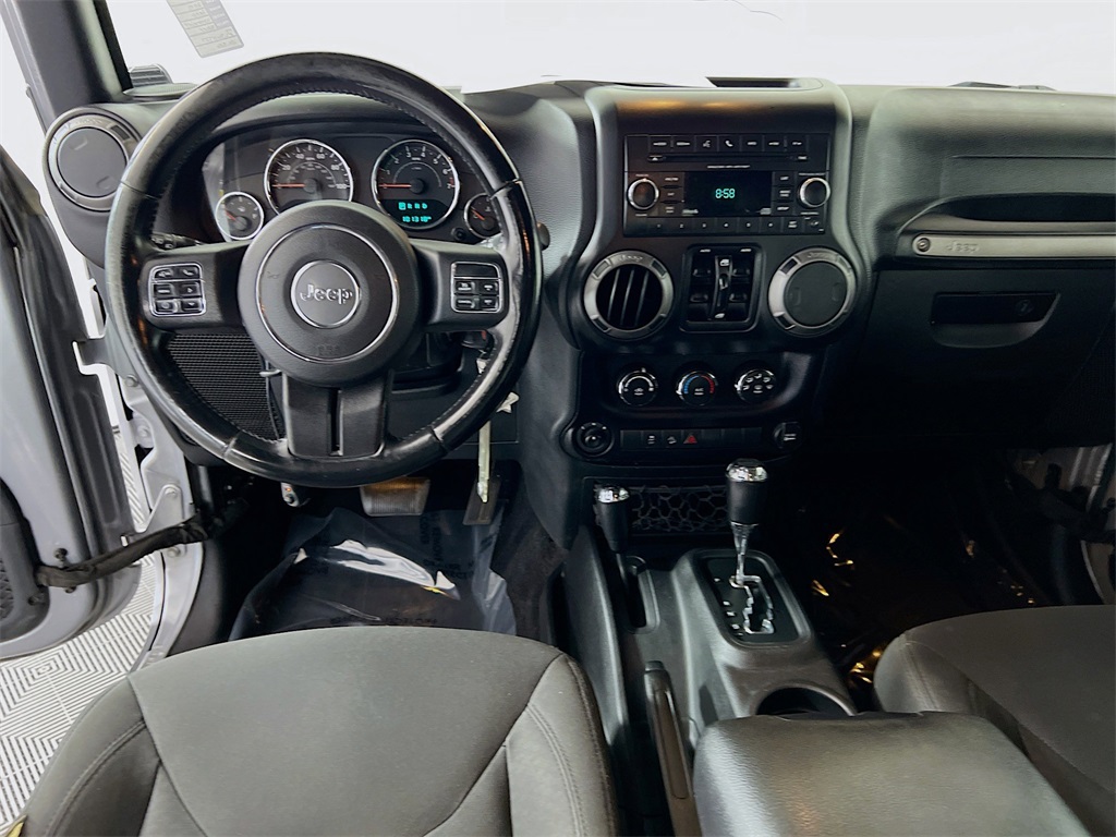 used 2015 Jeep Wrangler car, priced at $17,889