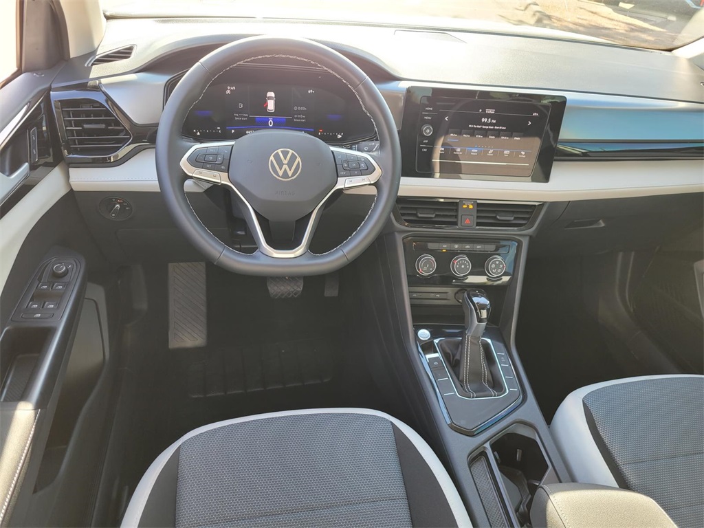 used 2025 Volkswagen Taos car, priced at $22,037