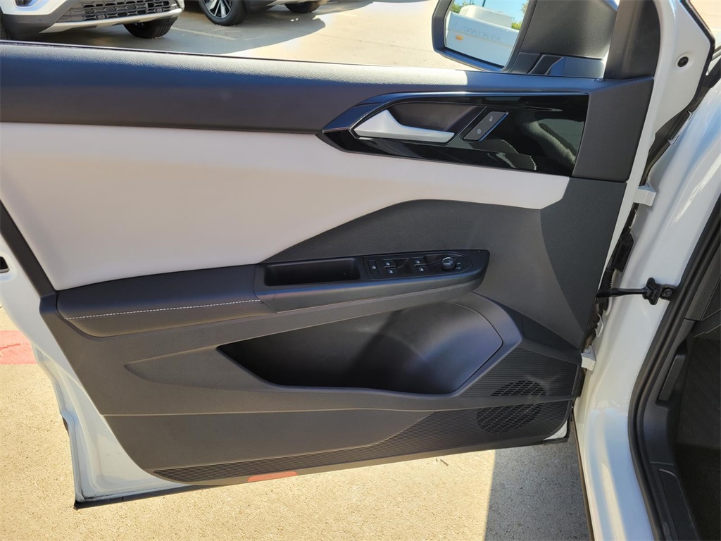 used 2025 Volkswagen Taos car, priced at $22,037