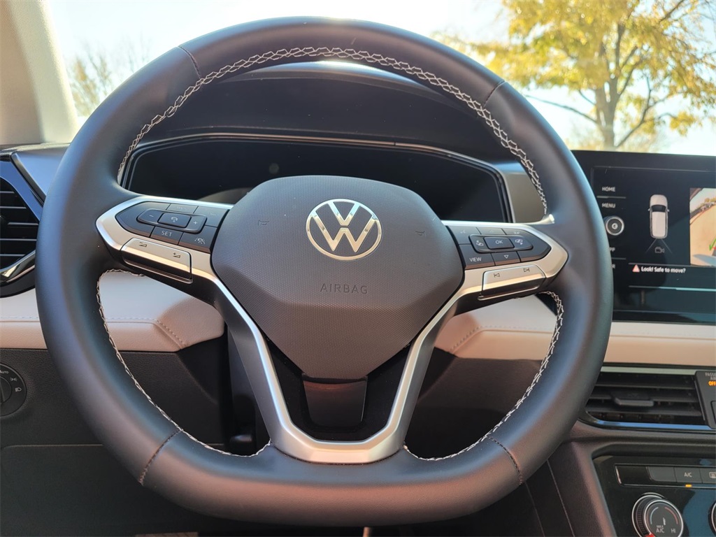 used 2025 Volkswagen Taos car, priced at $22,037