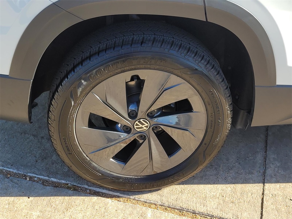 used 2025 Volkswagen Taos car, priced at $22,037