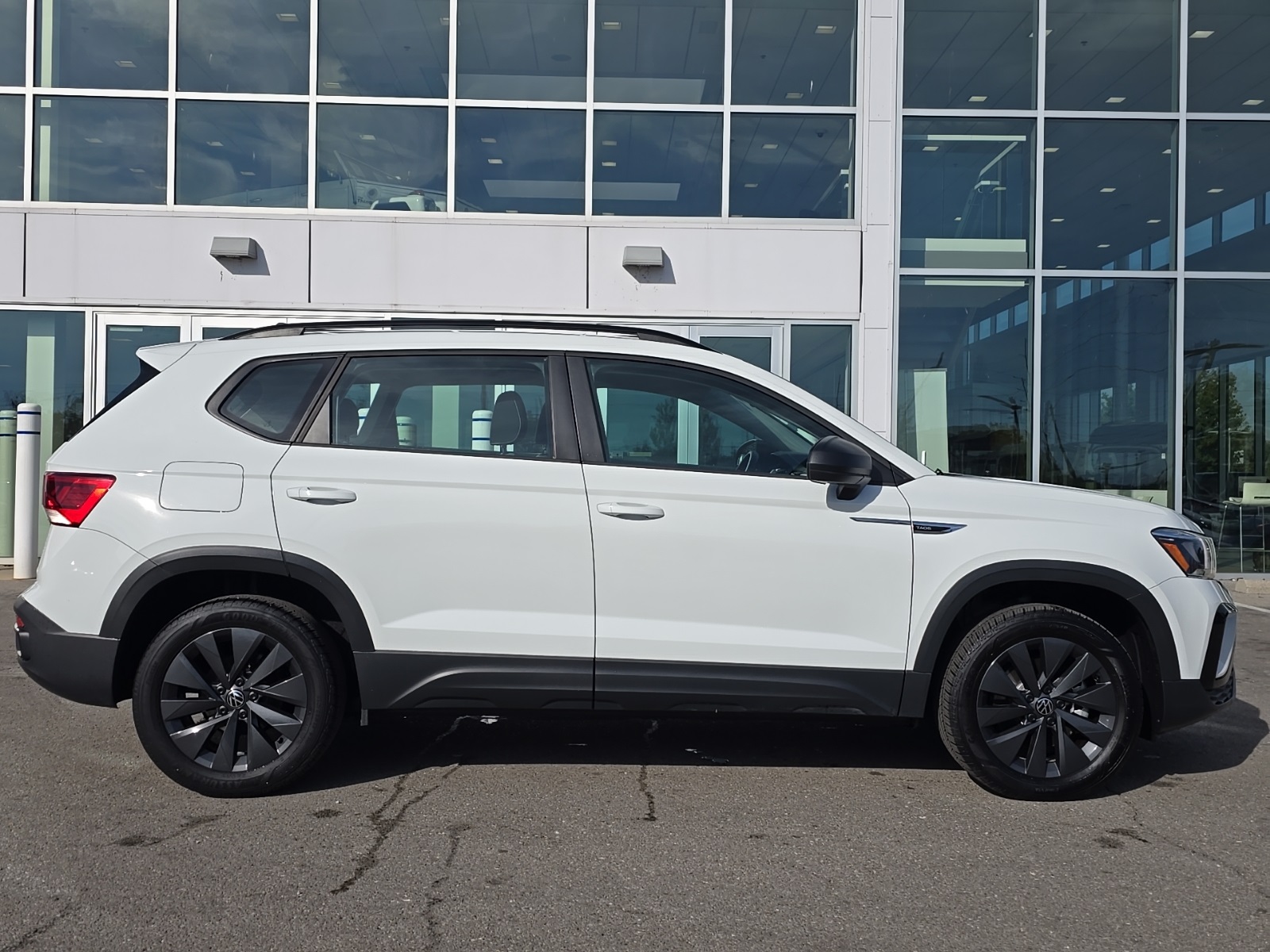 used 2024 Volkswagen Taos car, priced at $21,300