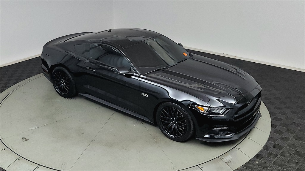 used 2016 Ford Mustang car, priced at $31,570