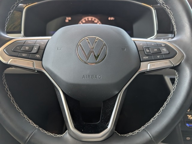 used 2025 Volkswagen Taos car, priced at $26,200