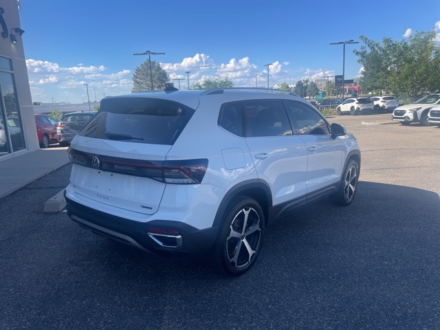 used 2025 Volkswagen Taos car, priced at $33,333