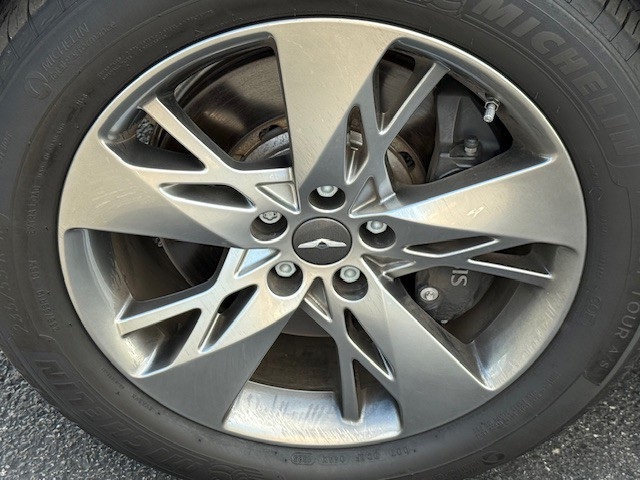 used 2024 Genesis GV70 car, priced at $51,297