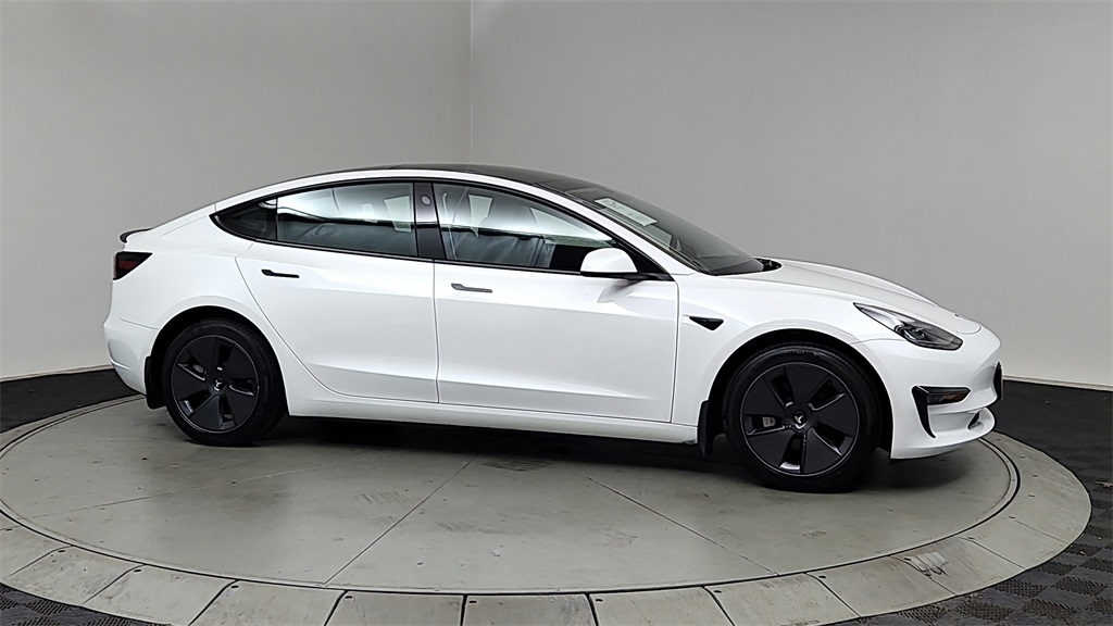 used 2023 Tesla Model 3 car, priced at $27,440