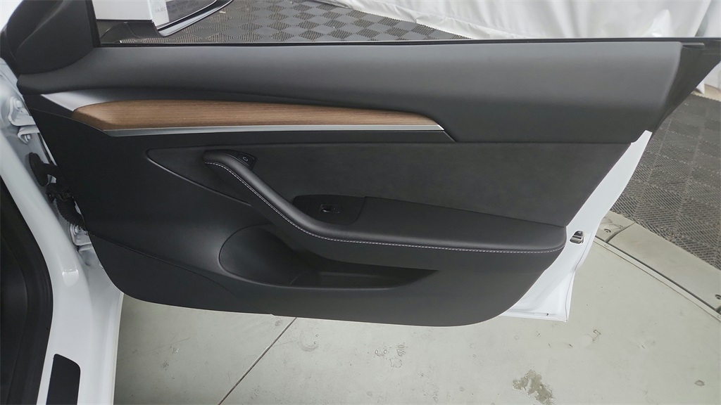 used 2023 Tesla Model 3 car, priced at $27,440
