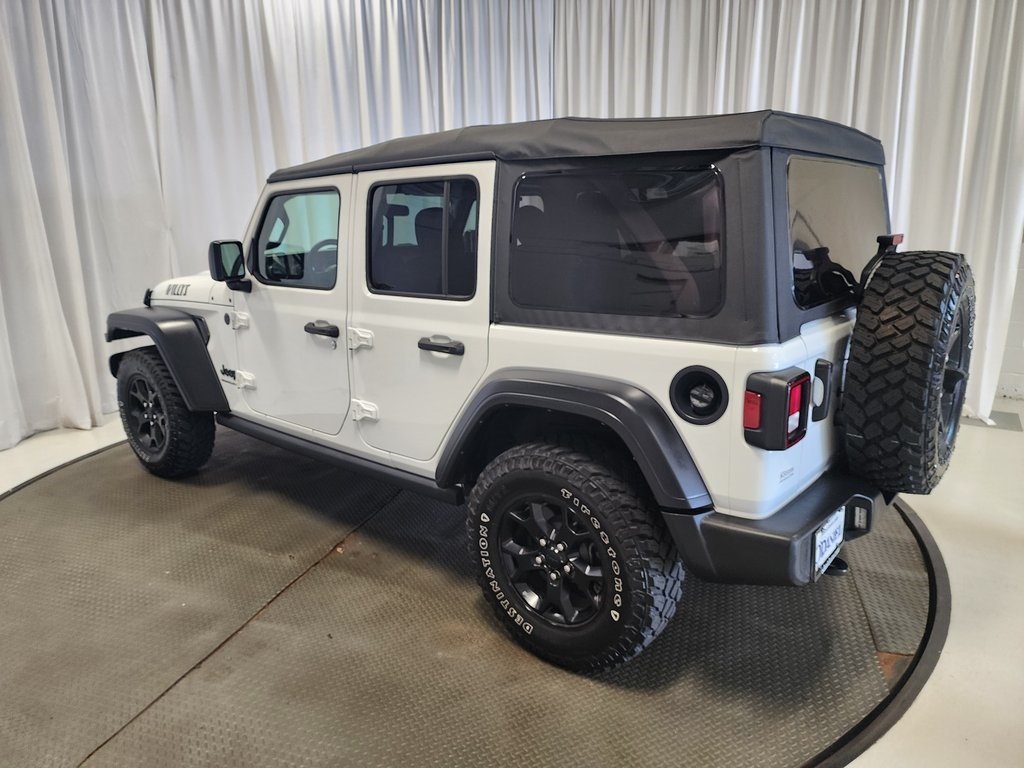 used 2023 Jeep Wrangler car, priced at $27,944