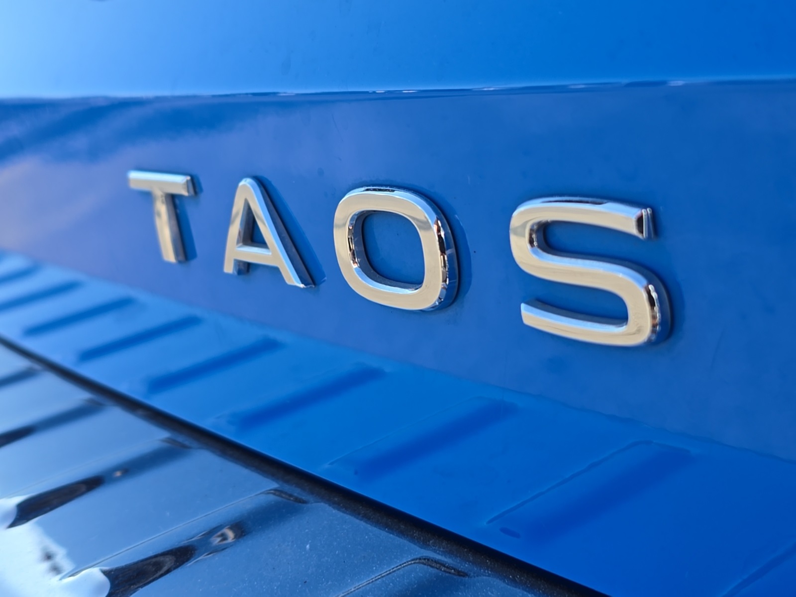 used 2022 Volkswagen Taos car, priced at $19,400