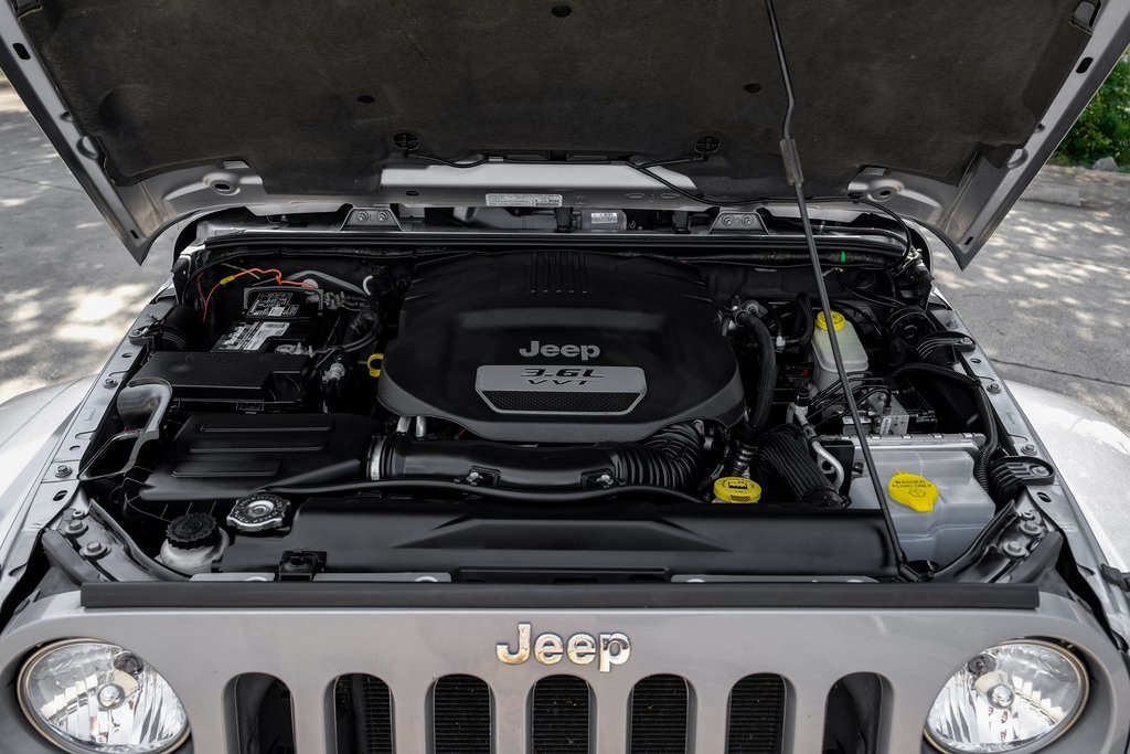 used 2013 Jeep Wrangler car, priced at $18,061