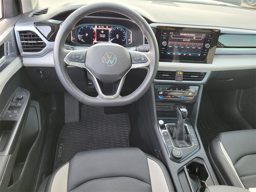 used 2025 Volkswagen Taos car, priced at $33,686