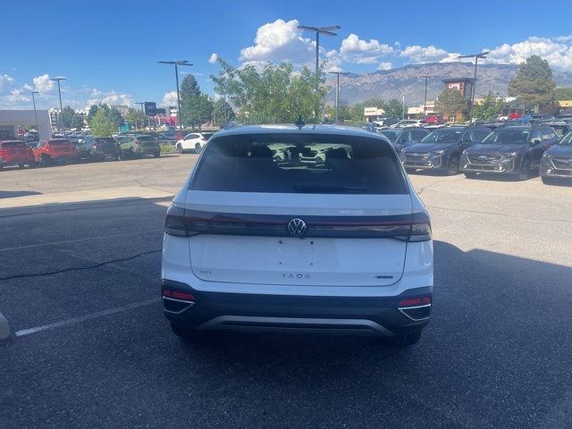 used 2025 Volkswagen Taos car, priced at $28,959