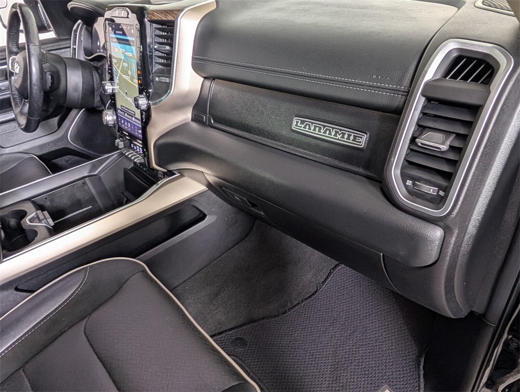 used 2019 Ram 1500 car, priced at $27,000